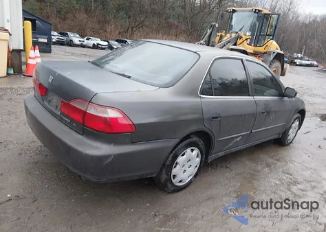 1999 Honda Accord Lx from USA, damaged, VIN 1HGCG6650XA076581